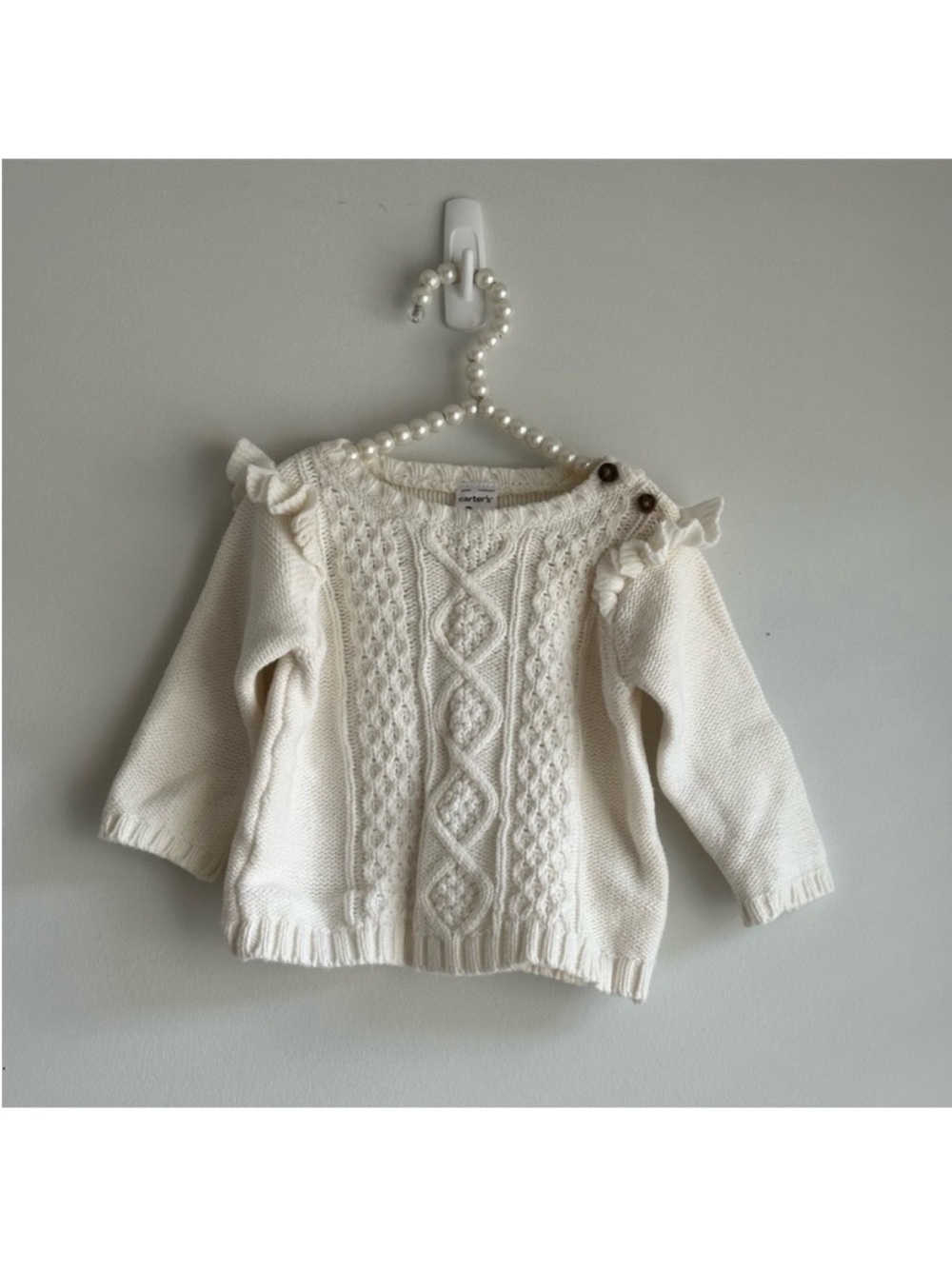 Cream Cable-Knit Ruffle Shoulder Sweater